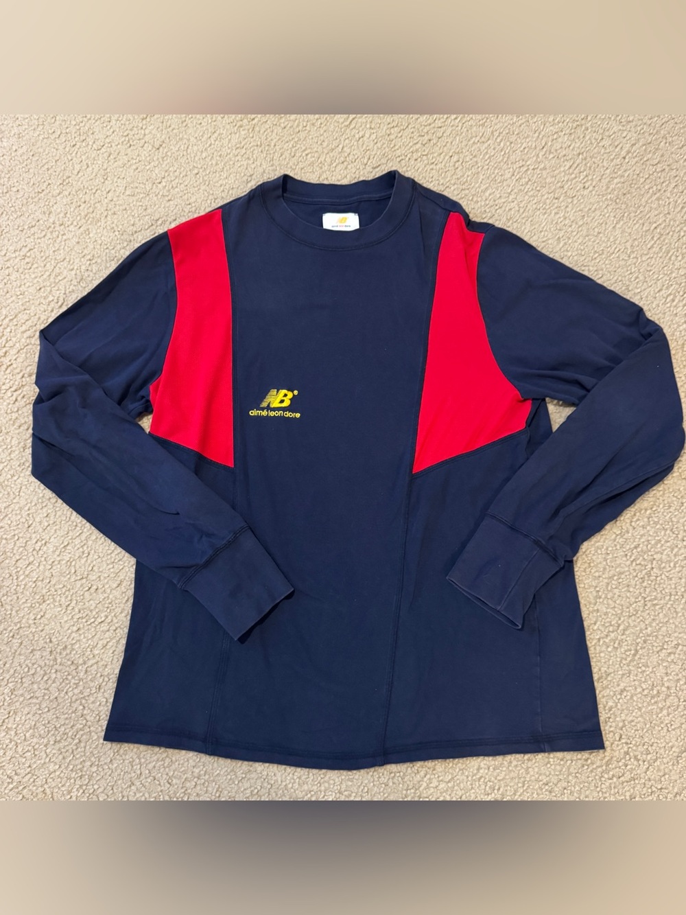 Aime Leon Dore New Balance Navy Crewneck with Yellow Logo Tag and red mesh panel